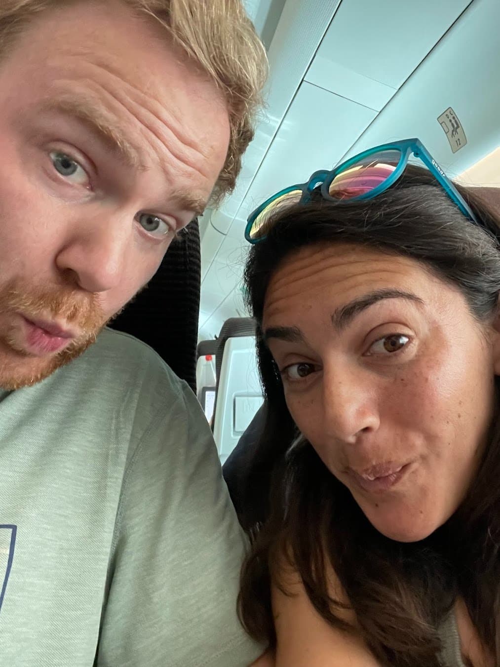 Erik and Ariana making silly, inquisitive faces.