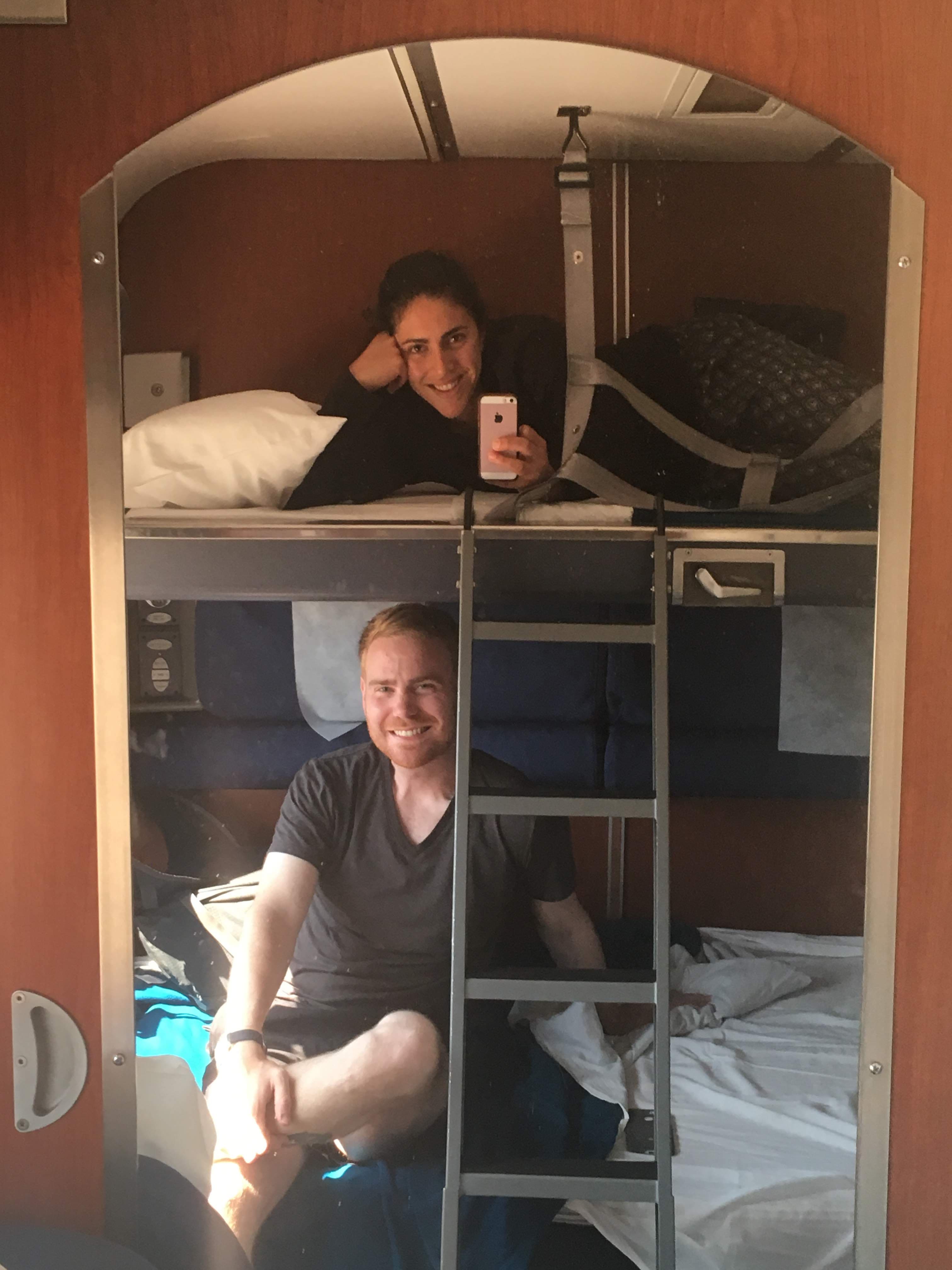 Ariana and Erik in an Amtrak bedroom, showing how big it can be