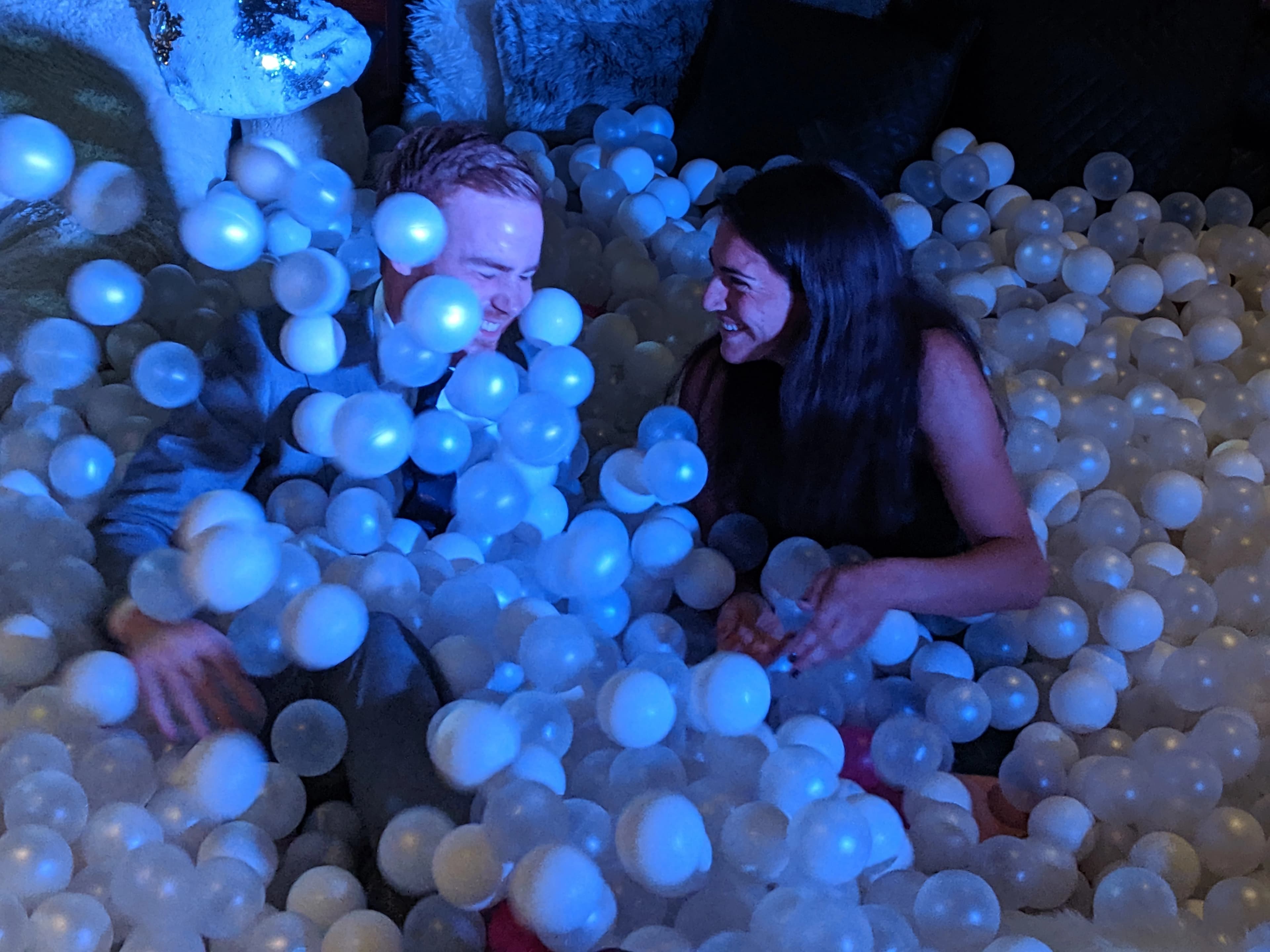 Ariana and Erik playing in a ball pit