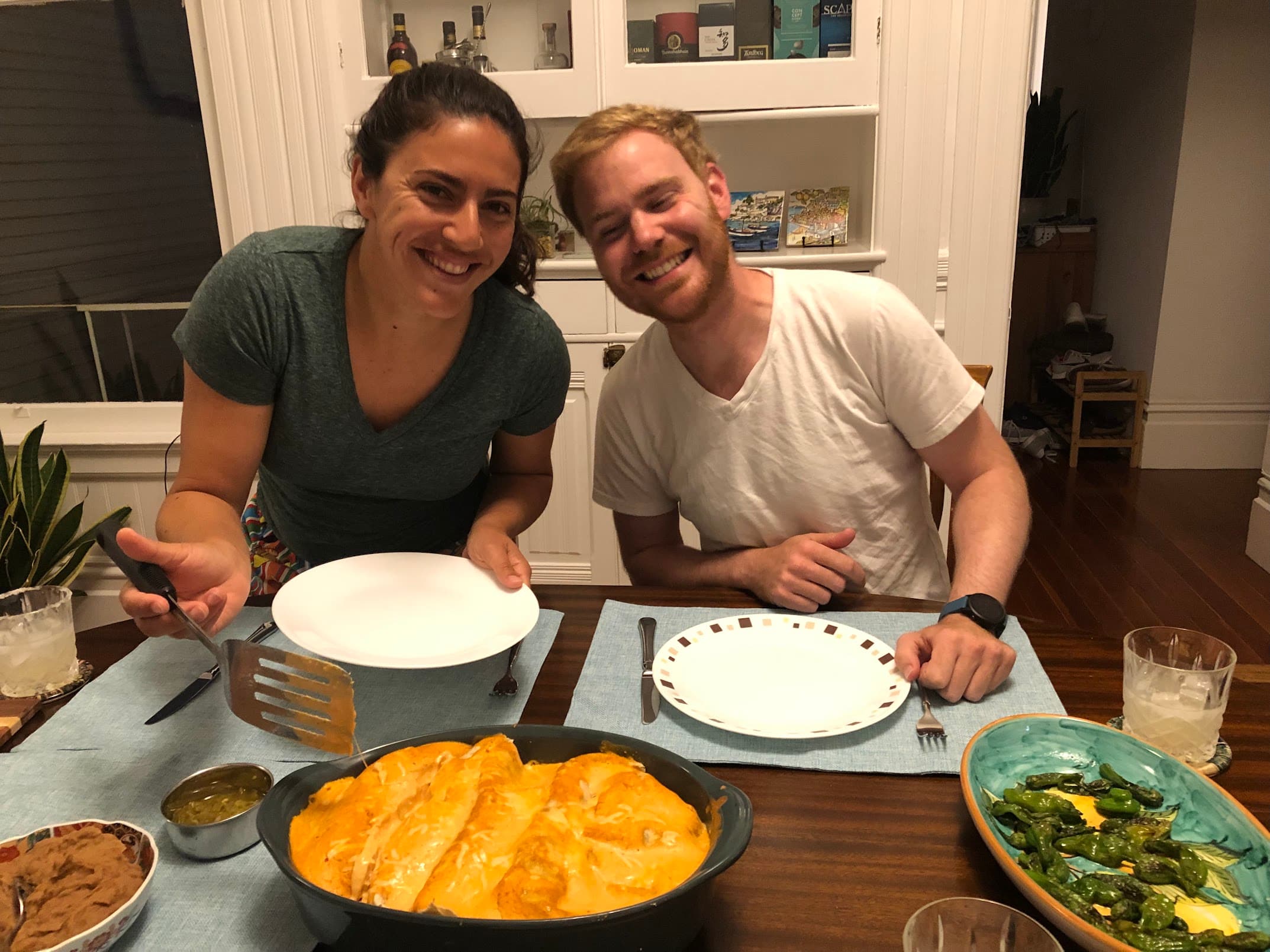 Ariana and Erik digging into freshly cooked enchiladas